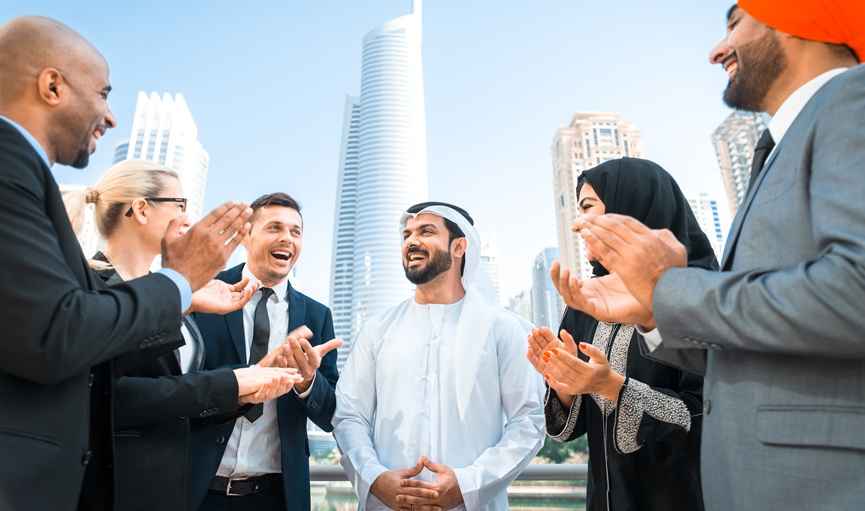 Smart strategies for UAE real estate-Group-people-front-buildings
