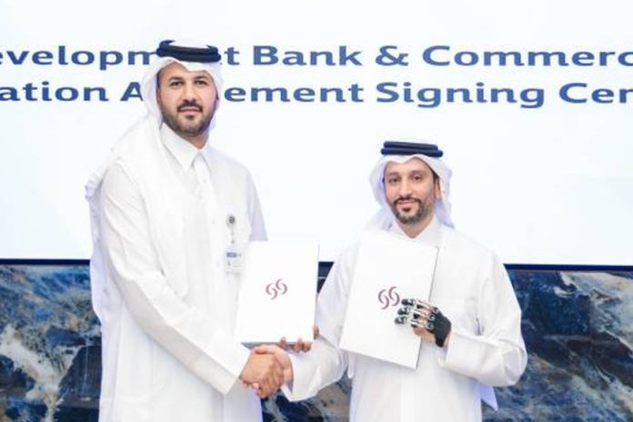 Commercial Bank-Qatar Development Bank agreement Commercial Bank-Qatar Development Bank agreement