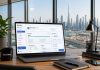 Company formation is becoming a dashboard GenZone UAE and US company formation dashboard displayed on a laptop in a Dubai office